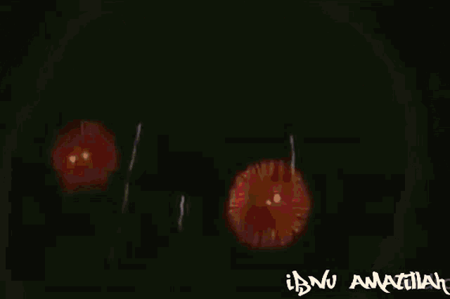 a drawing of two circles with the name ibnu amatullah on the bottom right