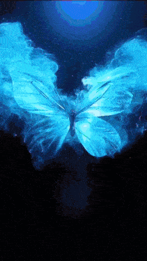 a blue butterfly is flying in the dark with smoke coming out of its wings