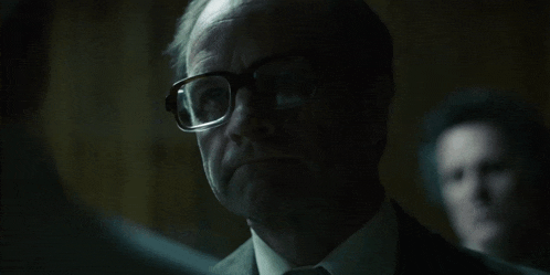 a man wearing glasses is asking if he is stupid
