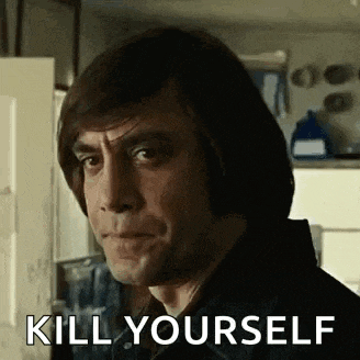 a close up of a man with the words `` kill yourself '' on his face .