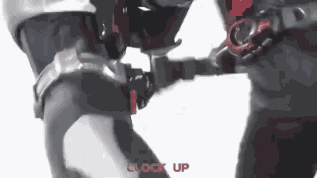 a close up of a person wearing a helmet and a glove .