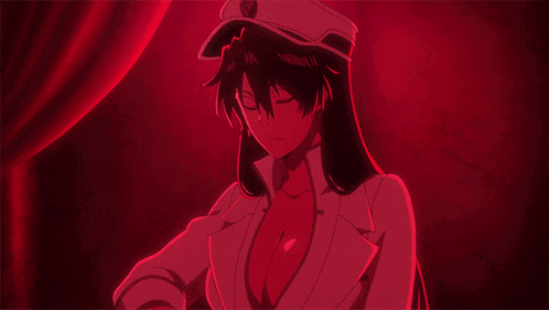 a woman in a white jacket and hat is standing in a red room