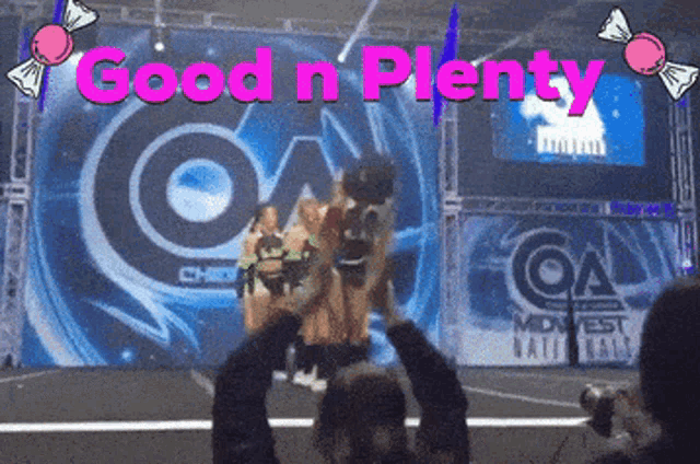 a group of cheerleaders on a stage with the words " good n plenty " on the bottom