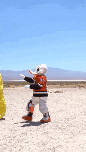 a mascot wearing a jersey with the number 99