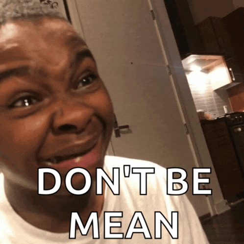a man making a funny face with the words " don 't be mean " on the bottom