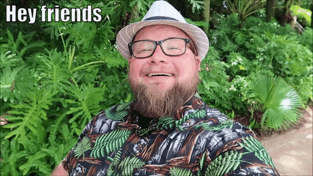a man with a beard wearing glasses and a hat with the words hey friends below him