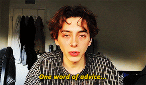 a young man says " one word of advice " in yellow letters