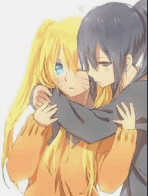 a man and a woman are hugging each other .