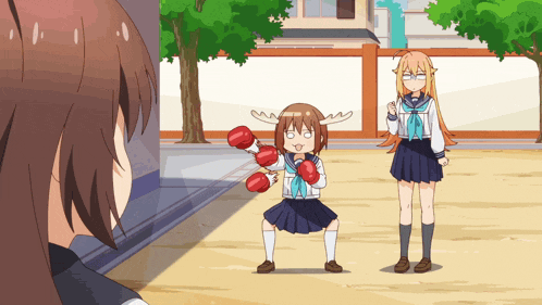 a girl with antlers is holding a pair of dumbbells