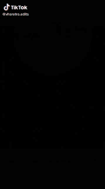 a close up of a person 's face with a tiktok logo on the bottom right corner .