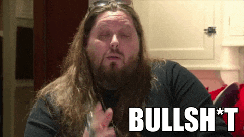 a man with long hair and a beard says bullsh*t