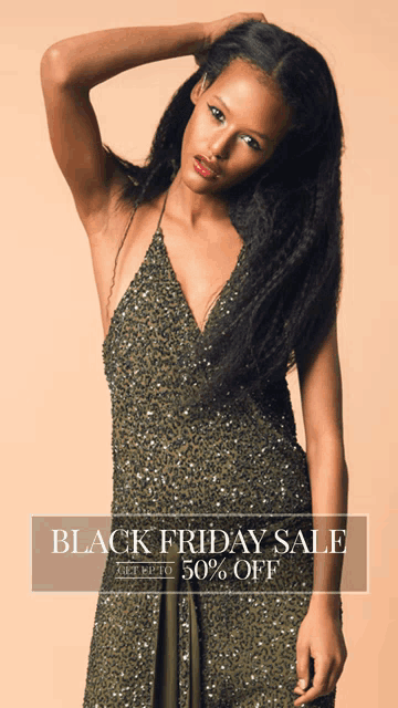 a woman in a sequined dress stands in front of a black friday sale banner