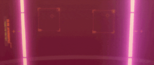 a dark room with purple lights coming out of the walls