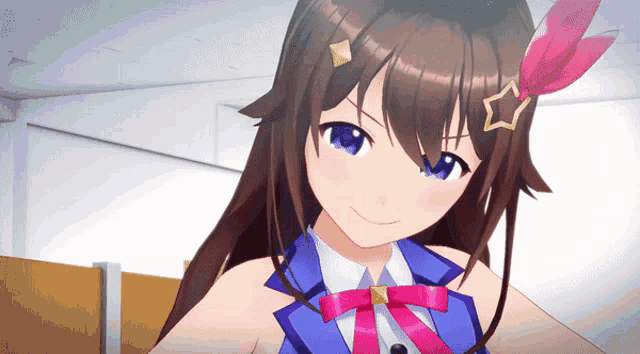 a girl with a star on her head is smiling