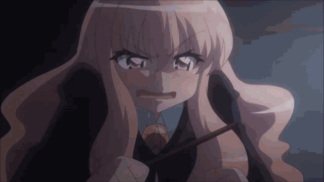 a girl with long pink hair is holding a wand and making an angry face