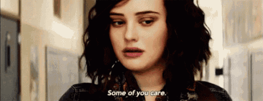 a woman is standing in a hallway talking to someone and saying `` some of you care '' .