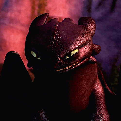a toothless from how to train your dragon looks at the camera with green eyes