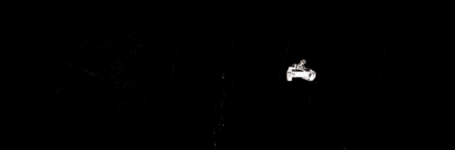 a sign that says ' ohmega ' in yellow letters on a black background