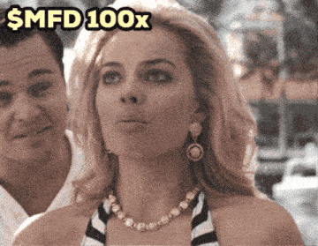 a woman with a necklace and earrings stands in front of a man with the caption $ mfd 100x