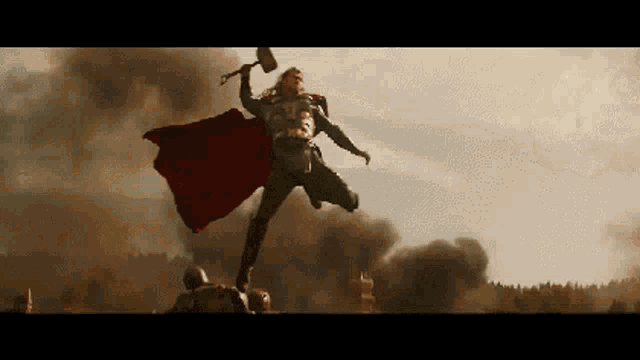 a pixelated image of thor holding a hammer in the air