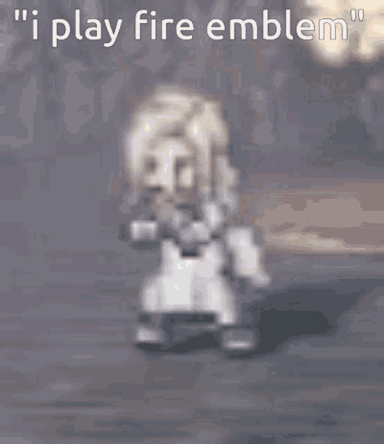 a blurred image of a person with the words " i play fire emblem " on the bottom