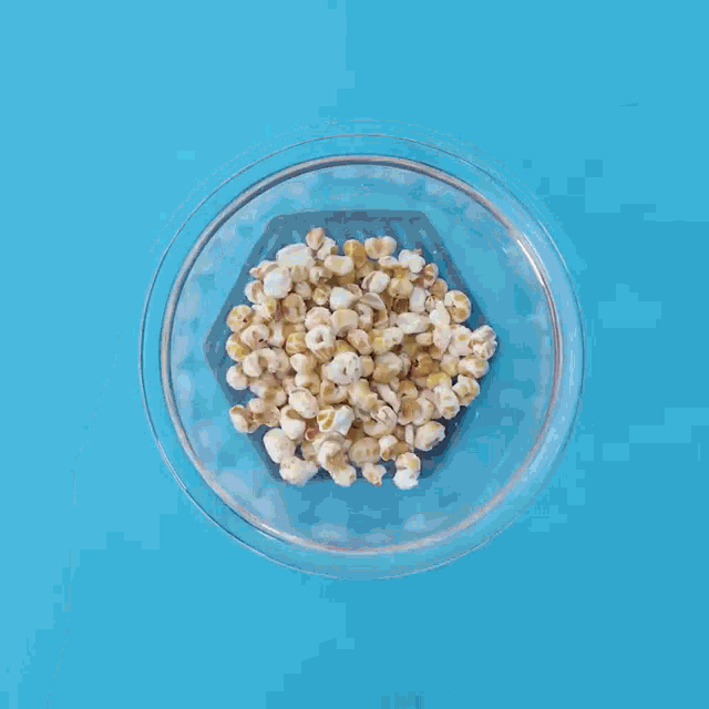 a person pouring milk into a bowl of cereal with chocolate white written on the bottom