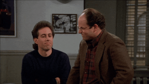two men are sitting next to each other and one of them says " not good " on the screen
