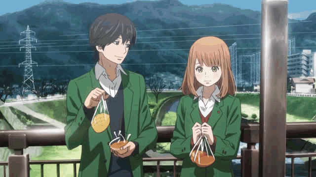a boy and a girl are standing next to each other on a bridge and the girl is holding a coin that says " love "