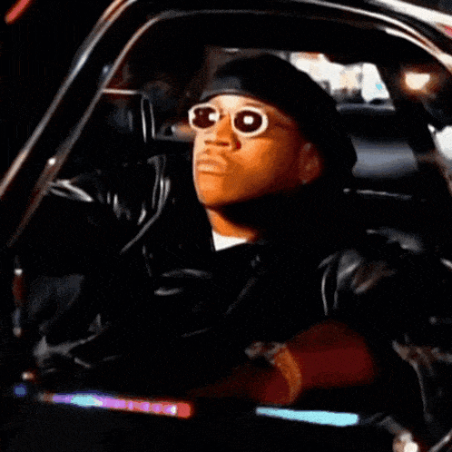 a picture of a man in a car with the caption chillin for the weekend grab some smoutai shots