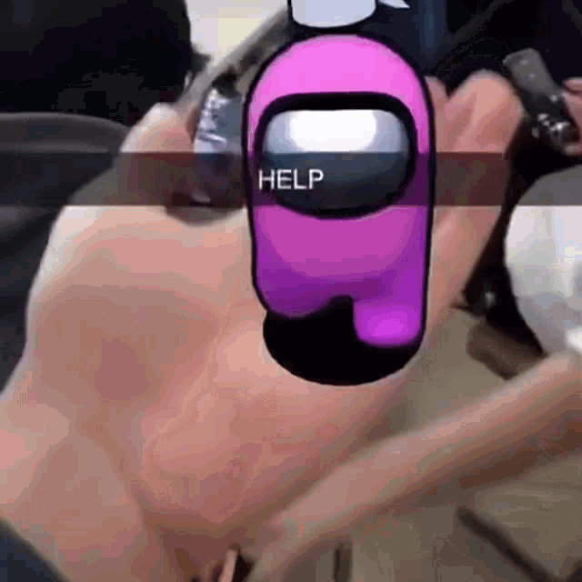 a person with a pink among us character on their face .