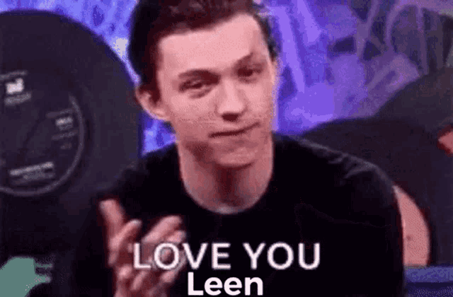 a man in a black shirt is giving a thumbs up and says `` love you leen '' .