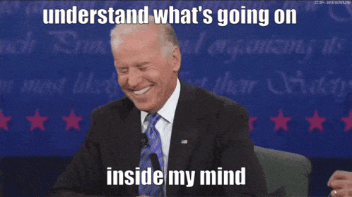 a man in a suit and tie is laughing with the words understand what 's going on inside my mind