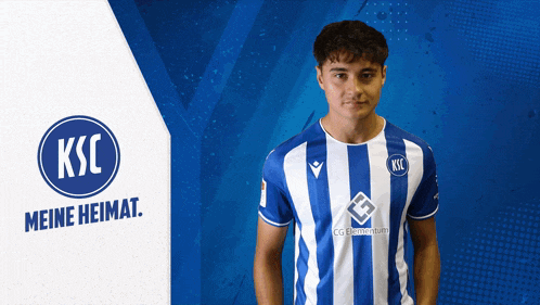 a man wearing a blue and white striped shirt with ksc meine heimat written on it