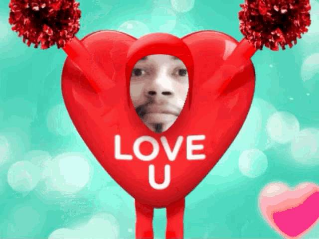 a red heart with a man 's face on it that says love u