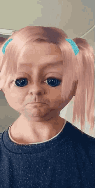 a little girl with pink hair is making a face