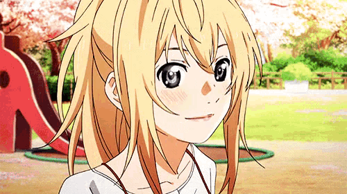 a blonde anime girl with long hair is standing in a park with cherry blossoms in the background .