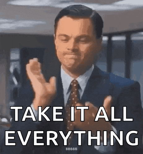 a man in a suit and tie is clapping his hands and says take it all everything .