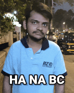 a man wearing a shirt that says rizvd hotel management