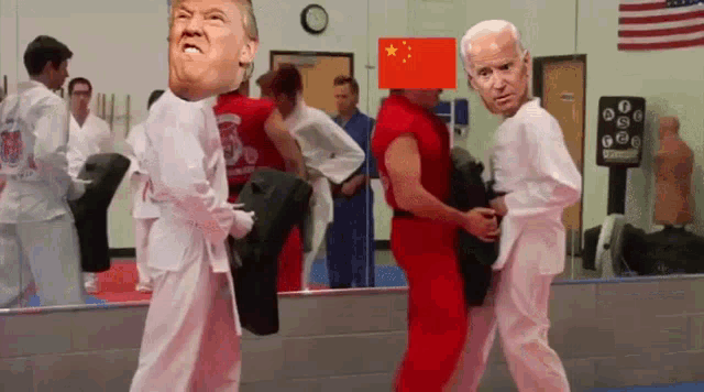 a group of people in karate uniforms with donald trump and joe biden on their faces