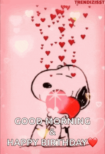snoopy is holding a heart in his mouth and hearts are falling from the sky .