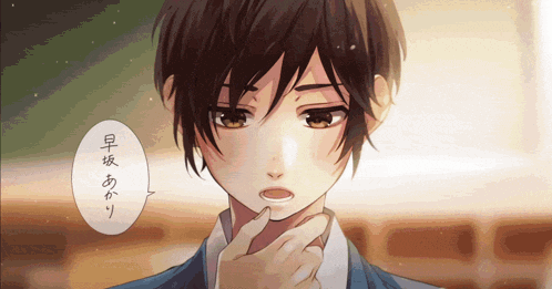 a close up of a boy 's face with chinese writing on the bottom right