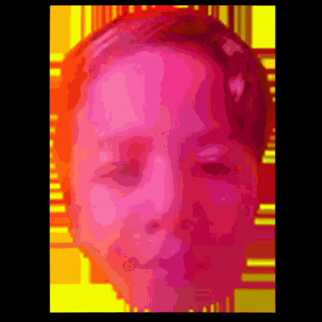 a close up of a person 's face with a yellow and red background