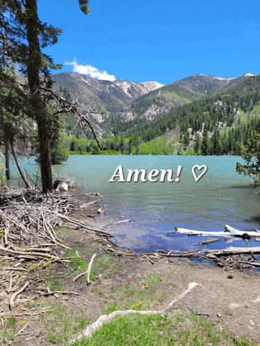 a picture of a lake with mountains in the background and the words amen on the bottom
