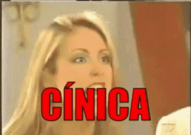 a close up of a woman 's face with the word cinica above her