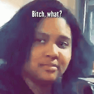 a close up of a woman 's face with the words `` bitch , what ? '' on it .