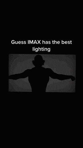 a silhouette of a man in a hat is on a black background and says `` guess imax has the best lighting ''