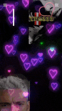 a man 's face is surrounded by hearts and the word ituabbe is on the bottom right