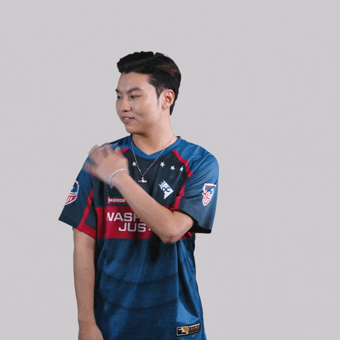 a man wearing a washington justice jersey stands with his arms crossed