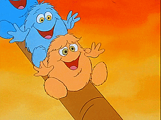a group of cartoon characters are sitting on a slide