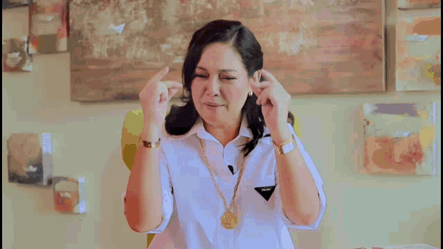 a woman in a white shirt with the word fighting written on the bottom